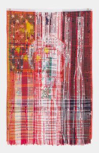 Colorful abstract woven tapestry with fringed bottom