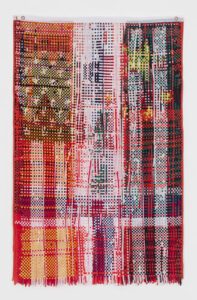 Multicolored checkered woven textile with fringe