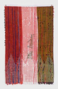 Abstract woven textile wall hanging with vertical stripes
