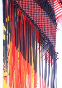 Red and black checkered fringed scarf