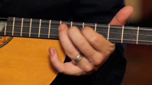 Closeup shot of a person playing a music instrument