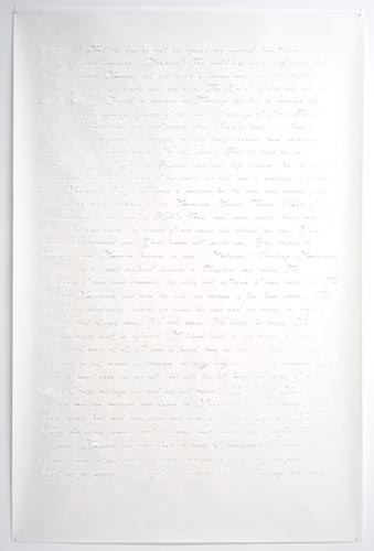 Faint handwritten text on white paper